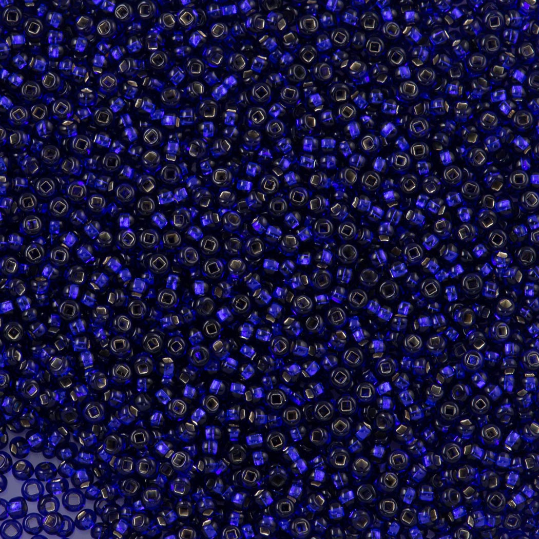 Czech Seed Bead 11/0 Transparent Cobalt Silver Lined (37100)