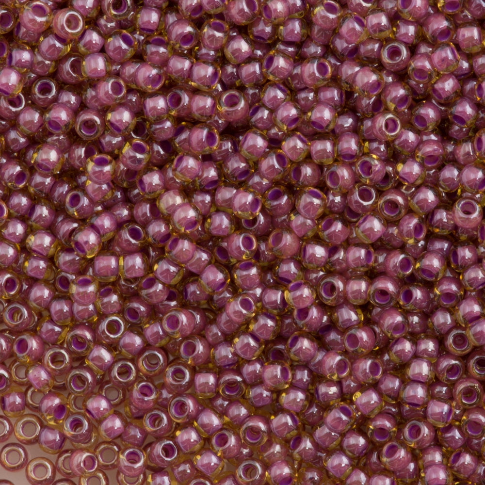 Toho Round Seed Beads 6/0 Inside Color Lined Dusty Mauve Amber (960)