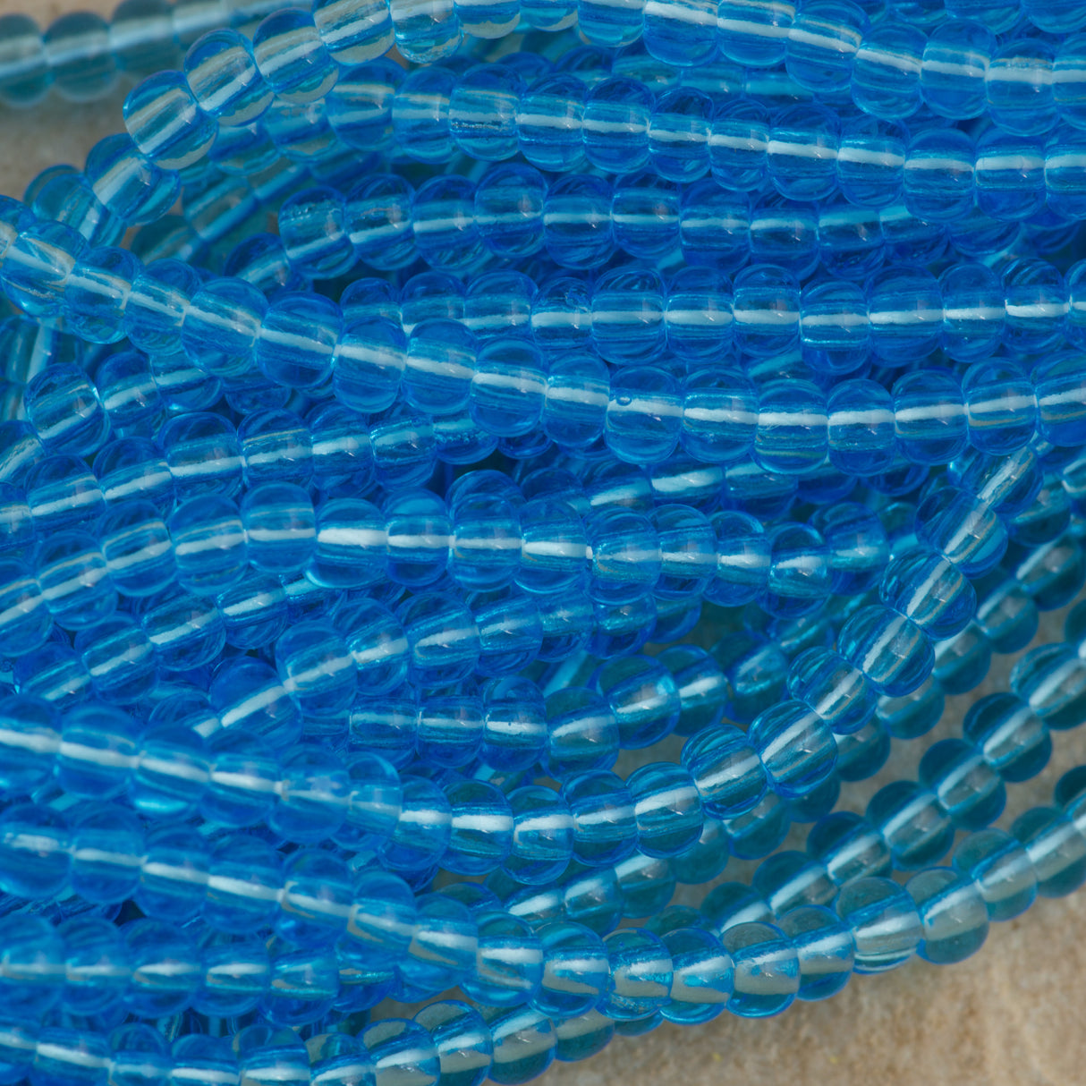 Czech Seed Bead 6/0 Transparent Aqua 50g (60010)