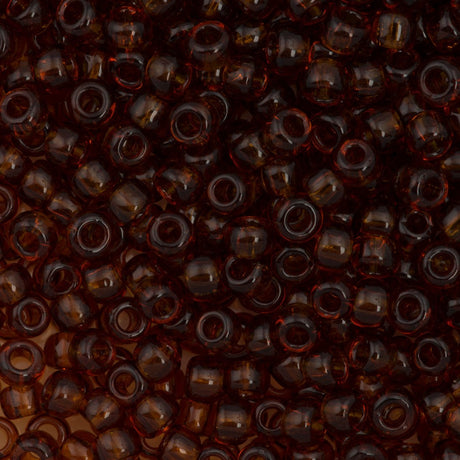 50g Toho Round Seed Bead 6/0 Transparent Smoky Topaz (941)