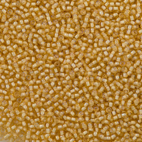 50g Toho Round Seed Bead 11/0 White Lined Buttercup (948)