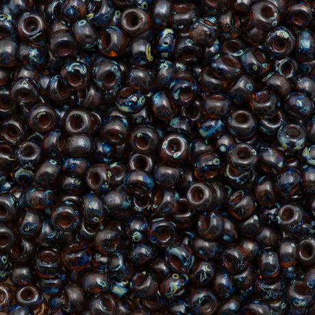 Miyuki Round Seed Bead 6/0 Transparent Dark Amber Picasso 20g Tube (4502)