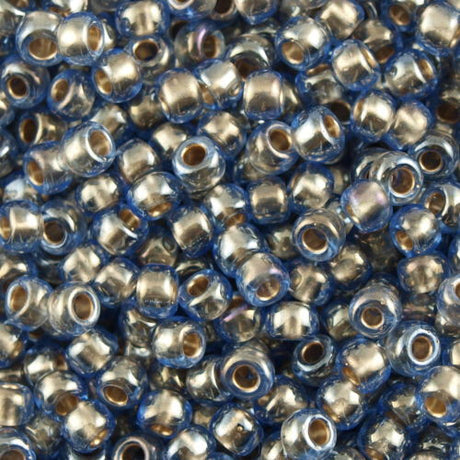 Toho Round Seed Beads 6/0 Inside Color Lined Gold Light Montana Blue 2.5-inch tube (992)