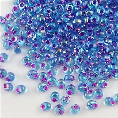 Miyuki 4mm Magatama Seed Bead Fuchsia Inside Color Lined Blue AB 10g (2169)