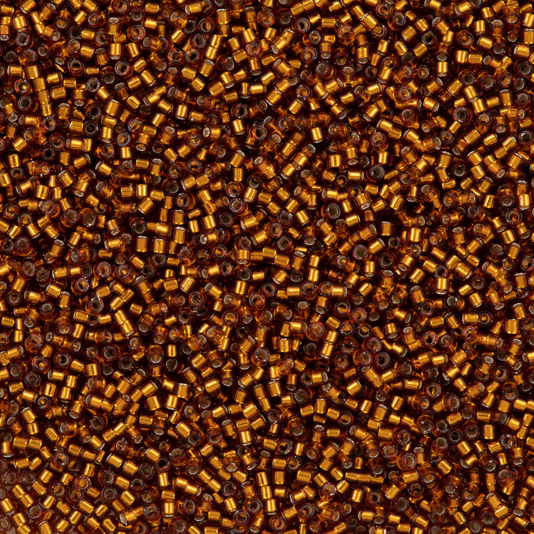 25g Miyuki Delica Seed Bead 11/0 Silver Lined Amber DB144