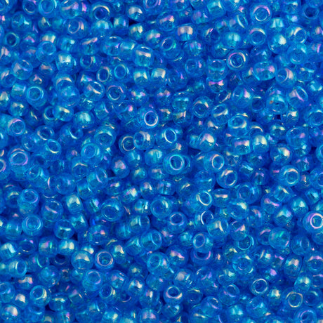 50g Toho Round Seed Bead 6/0 Transparent Dark Caribbean AB (163B)