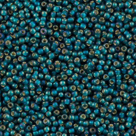 50g Toho Round Seed Beads 11/0 Matte Silver Line Teal AB (2027BDF)