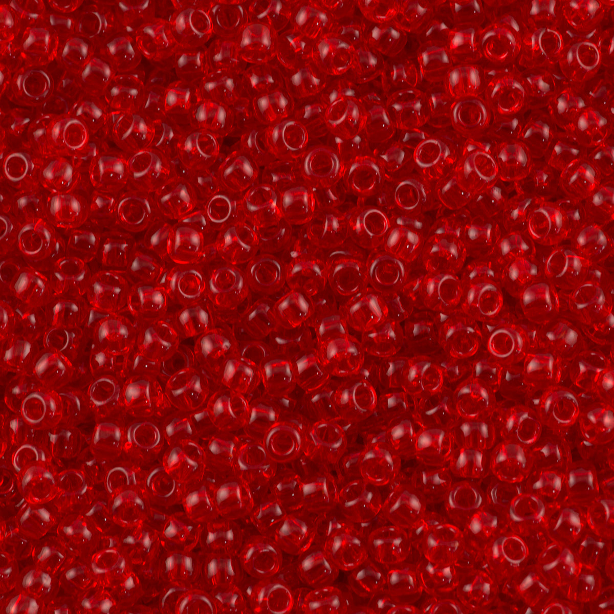 Toho Round Seed Beads 6/0 Transparent Ruby 2.5-inch tube (5B)