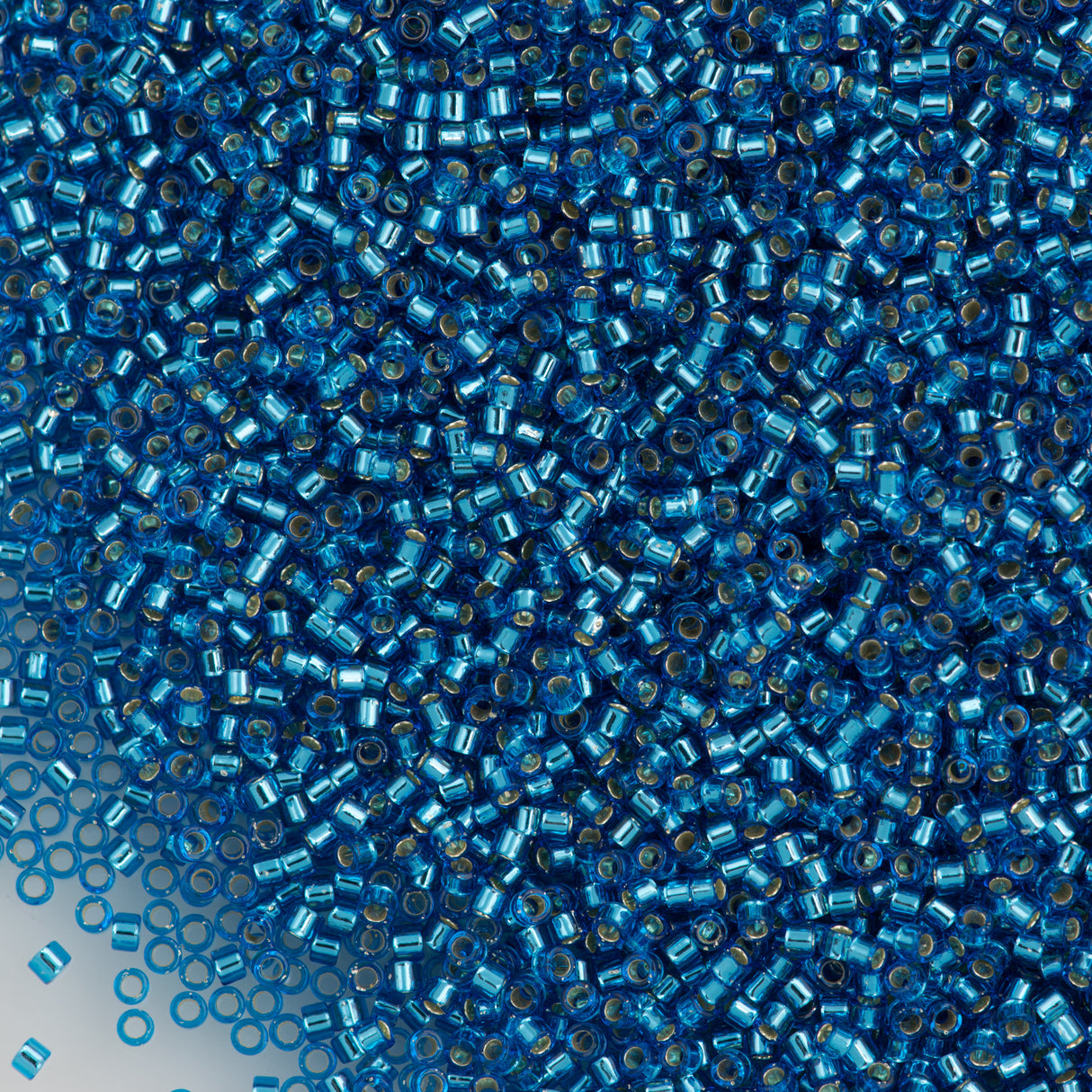 25g Miyuki Delica Seed Bead 11/0 Silver Lined Capri Blue DB149