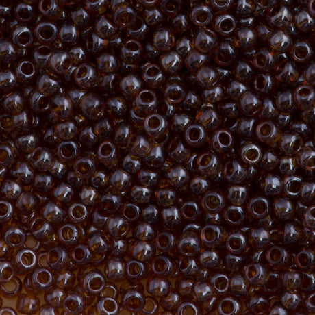 50g Toho Round Seed Bead 11/0 Transparent Smoky Topaz Luster (114)