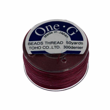 Toho One-G Nylon Burgundy Thread 50 yard bobbin