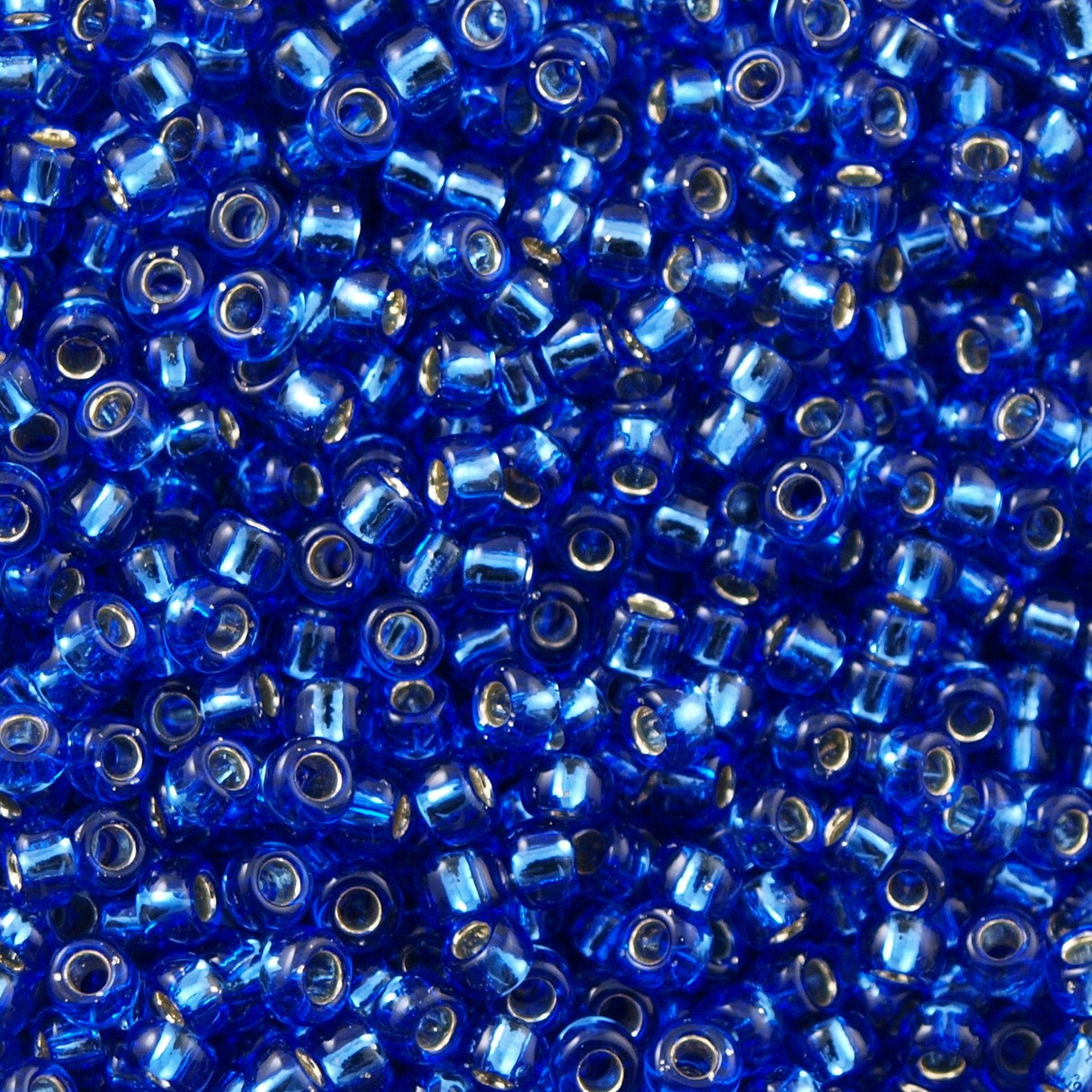 50g toho Round Seed Bead 8/0 Silver Lined Montana Blue (35)