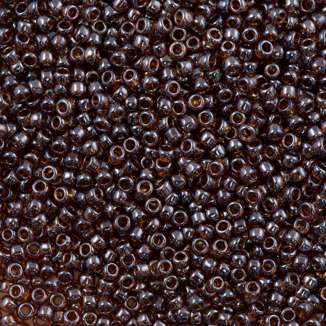 50g Toho Round Seed Bead 8/0 Transparent Lustered Smoky Topaz (114)