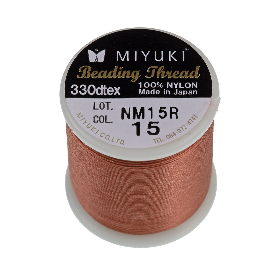 https://www.auracrystals.com/cdn/shop/products/miyuki-50m-330-dtex-beading-thread-nutmeg-xh-pt-0068.jpg?v=1642150910