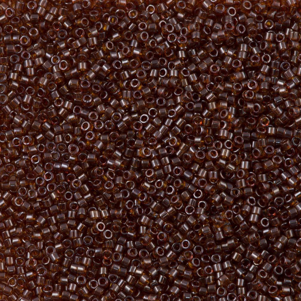 25g Miyuki Delica Seed Bead 11/0 Transparent Dark Topaz Luster DB1891