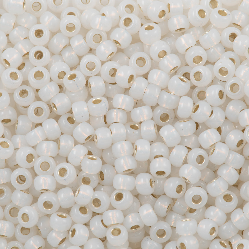 Miyuki Round Seed Bead 6/0 Gilt Lined Opal (551)