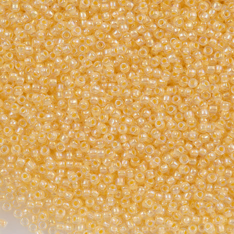 50g Toho Round Seed Bead 11/0 Inside Color Lined Creamsicle AB (1846)