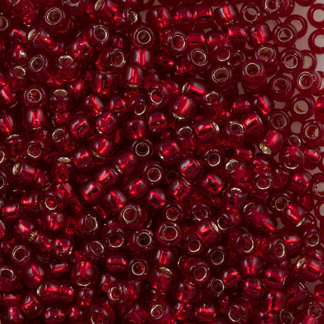 50g Toho Round Seed Beads 6/0 Silver Lined Dark Garnet (25D)