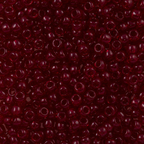 50g Toho Round Seed Beads 6/0 Transparent Dark Garnet (5D)